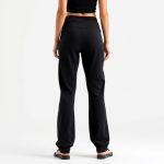 Back view of a model wearing black jogger pants wide leg yoga pants in Australia, showcasing fit on pure white background.