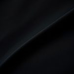 Close-up of black long sleeve gym top fabric, showcasing Pima Cotton texture, stitching, and quality.