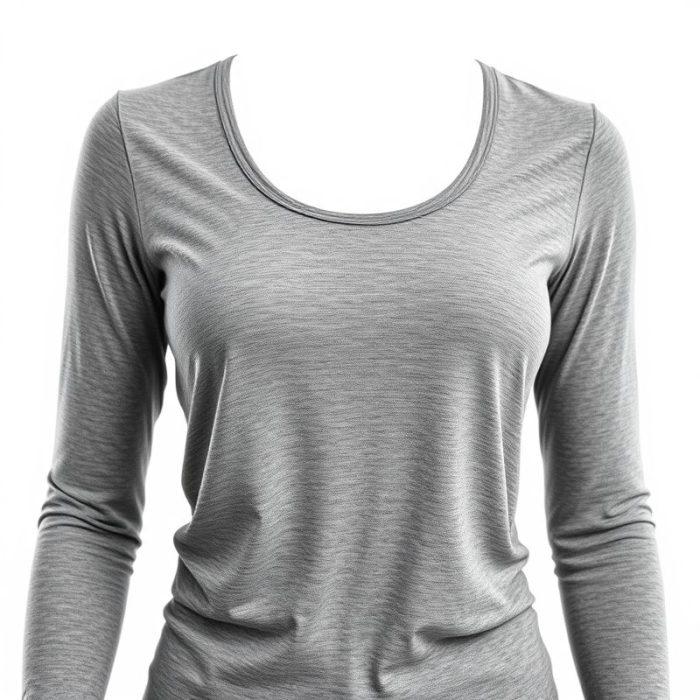 A long sleeve yoga top in Heather Grey, part of yoga outfits for women, on a white studio background.