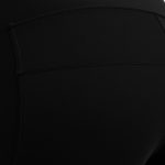 Close-up of high-quality fabric and stitching on black cycling shorts leggings with pockets for women.