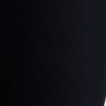 Close-up of black flared leggings fabric, highlighting scrunch bum detail, stitching, and premium material quality.