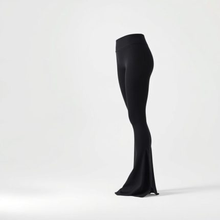 Black yoga pants flare from Luna on a clean white studio background.