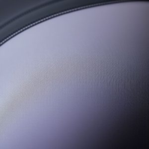 Close-up of high waisted bum scrunch leggings fabric showing moisture-wicking performance material, stitching, and texture.