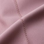 Close-up of the cashmere blend fabric and stitching on flare active pants sculpting dreams, highlighting texture and quality.