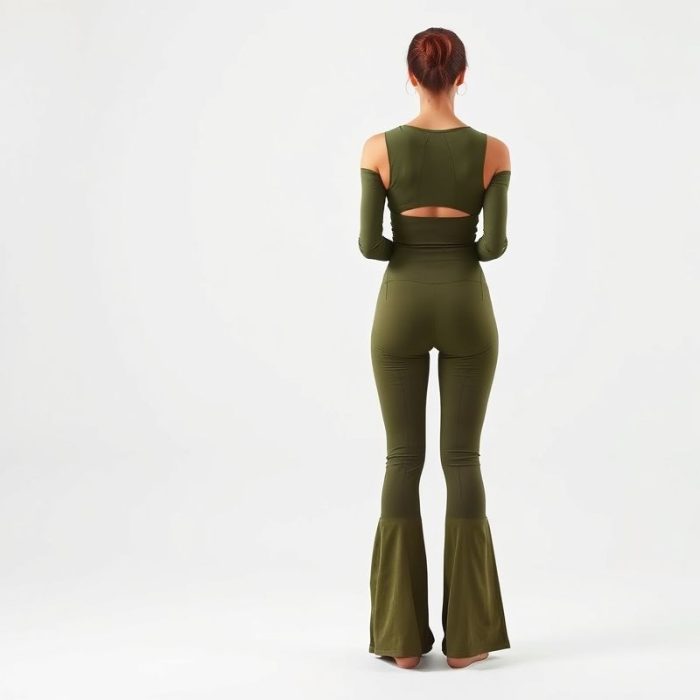 Back view of Olive Green flare active pants made with Lenzing Ecovero, on a model.
