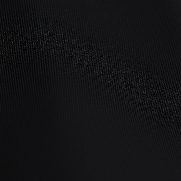 Close-up of flare black yoga pants fabric, showcasing texture, stitching, and recycled material quality for petite flare leggings in Australia.