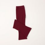 Flat lay of burgundy flare leggings plus size with scrunch bum, neatly folded on a neutral surface.