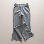 Flat lay of Heather Grey organic cotton flare yoga pants Australia, neatly folded.