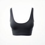 Long sleeve yoga top womens active crop top in charcoal on white background, hyperrealistic studio photo.