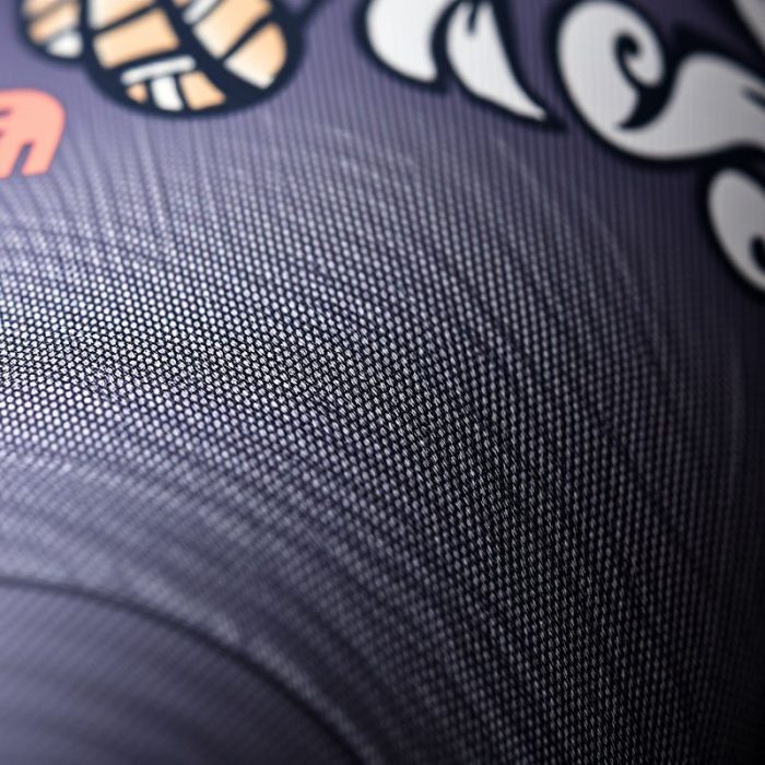 Close-up of Luna & Co printed yoga pants showing fabric texture and stitching detail.