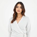 A Heather Grey cotton knit white wrap top on a white background.