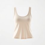 A beige white yoga top made with Lenzing Ecovero fabric on a white background.