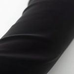 Close-up of the fabric texture and stitching on wide leg yoga pants Australia flare black yoga pants, showcasing quality material.