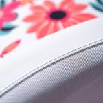 Close-up detail of the printed yoga crop pants fabric texture and stitching.