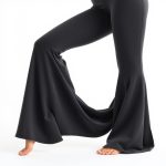 Yoga flare pants in Charcoal made from soft organic bamboo fabric on a white background.