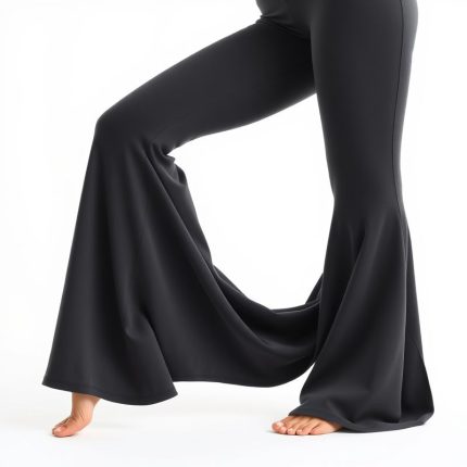 Yoga flare pants in Charcoal made from soft organic bamboo fabric on a white background.