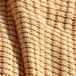 Close-up of the organic knit fabric texture and stitching in this Australian-made yoga set.